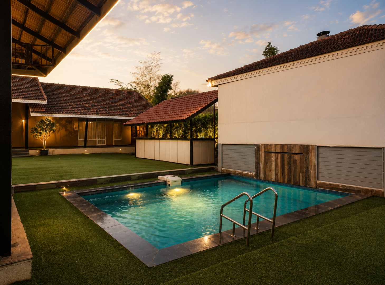 Pool with cottages at golden hour
